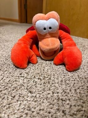 Disney Store Sebastian plush toy from The Little Mermaid.